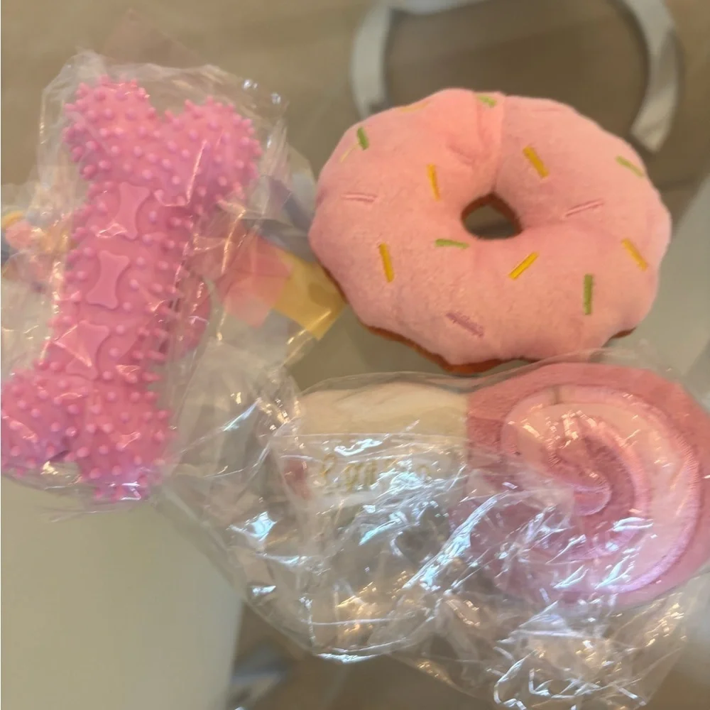 Pink Donut and Bone Toy Set Of 4 For Your Furry Legs . Brand New .